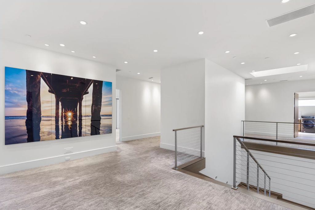 The Masterpiece in Las Vegas, a stunning contemporary home majestically perched within the prestigious guard-gated Spanish Hills offering some of the best Las Vegas Strip views. This home located at 5198 Scenic Ridge Dr, Las Vegas, Nevada.