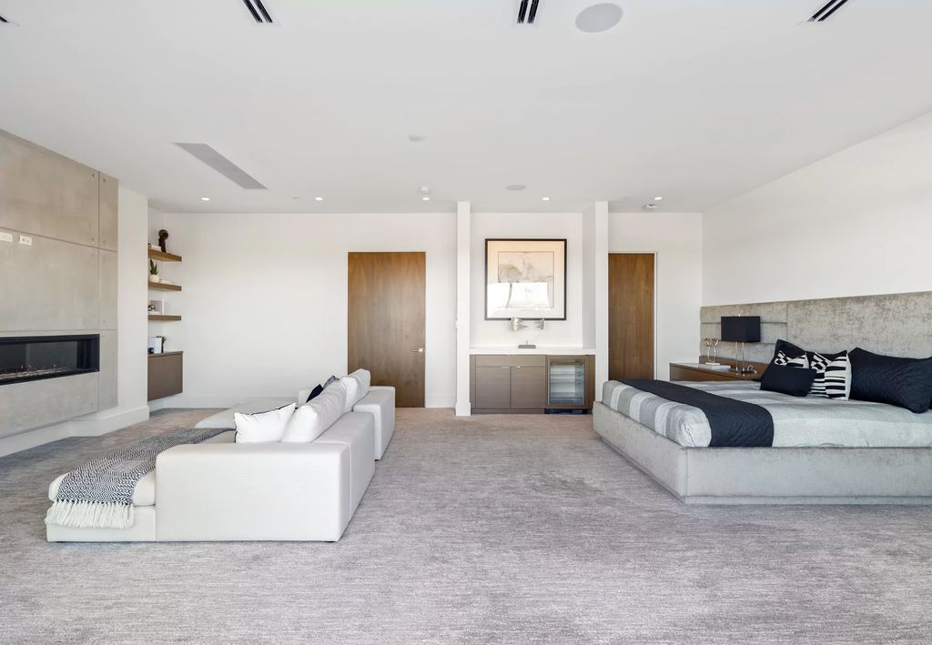 The Masterpiece in Las Vegas, a stunning contemporary home majestically perched within the prestigious guard-gated Spanish Hills offering some of the best Las Vegas Strip views. This home located at 5198 Scenic Ridge Dr, Las Vegas, Nevada.