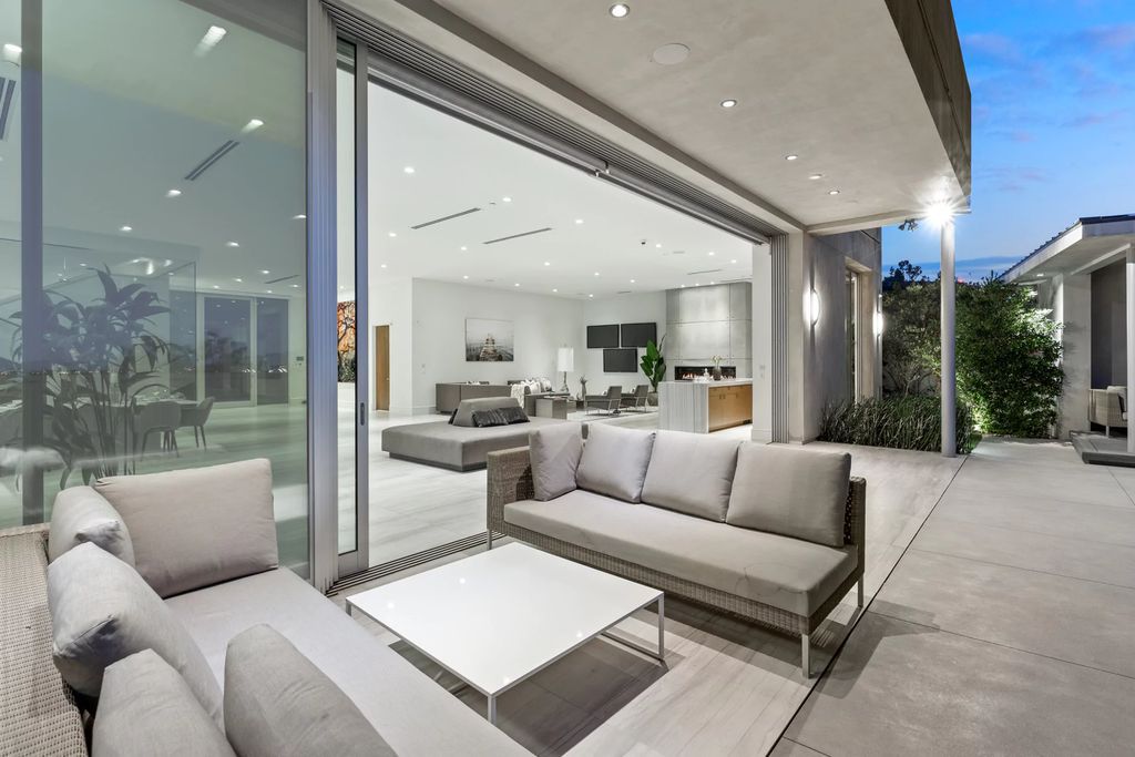 The Masterpiece in Las Vegas, a stunning contemporary home majestically perched within the prestigious guard-gated Spanish Hills offering some of the best Las Vegas Strip views. This home located at 5198 Scenic Ridge Dr, Las Vegas, Nevada.