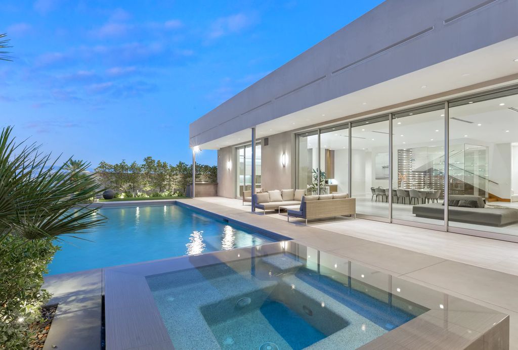 The Masterpiece in Las Vegas, a stunning contemporary home majestically perched within the prestigious guard-gated Spanish Hills offering some of the best Las Vegas Strip views. This home located at 5198 Scenic Ridge Dr, Las Vegas, Nevada.