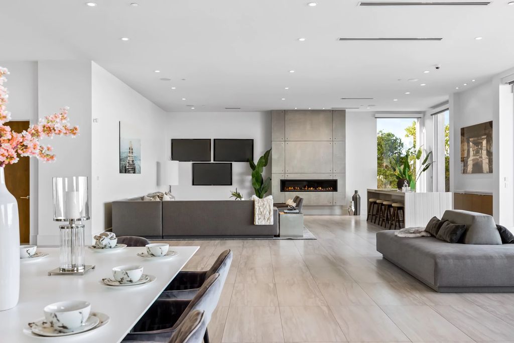 The Masterpiece in Las Vegas, a stunning contemporary home majestically perched within the prestigious guard-gated Spanish Hills offering some of the best Las Vegas Strip views. This home located at 5198 Scenic Ridge Dr, Las Vegas, Nevada.