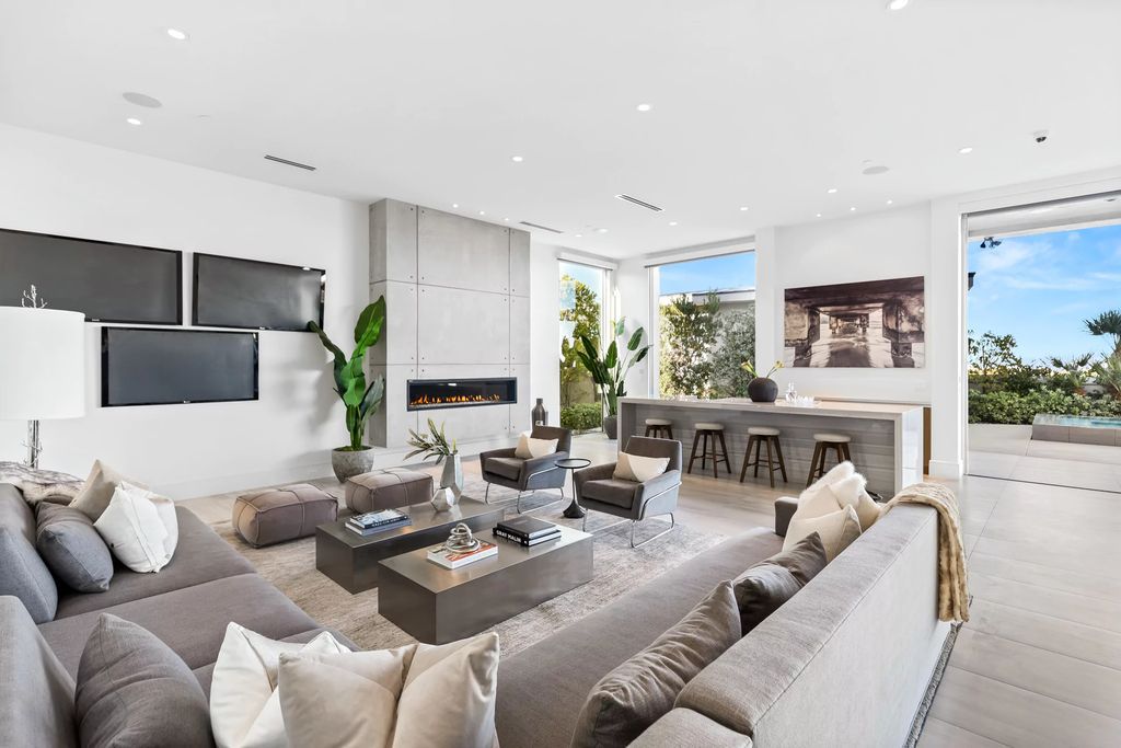 The Masterpiece in Las Vegas, a stunning contemporary home majestically perched within the prestigious guard-gated Spanish Hills offering some of the best Las Vegas Strip views. This home located at 5198 Scenic Ridge Dr, Las Vegas, Nevada.