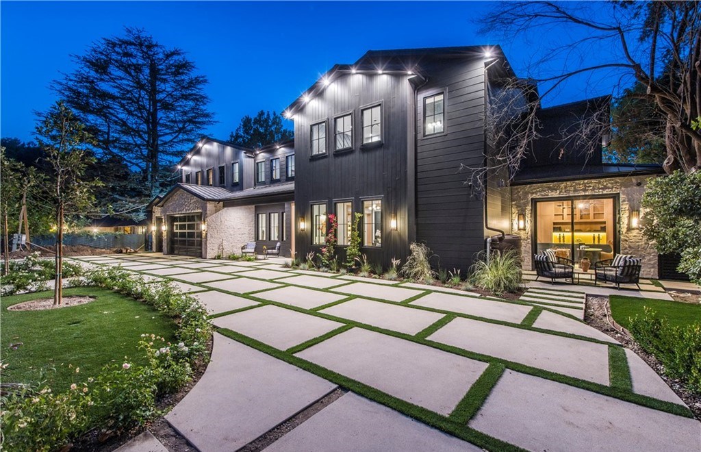 The Farmhouse in Encino, Exquisite new construction gated estate in the coveted enclave of Royal Oaks neighborhood with the sprawling grounds featuring a sparkling pool & spa, sports court, spacious elevated patio, grass area. This home located at 15825 Woodvale Rd, Encino, California