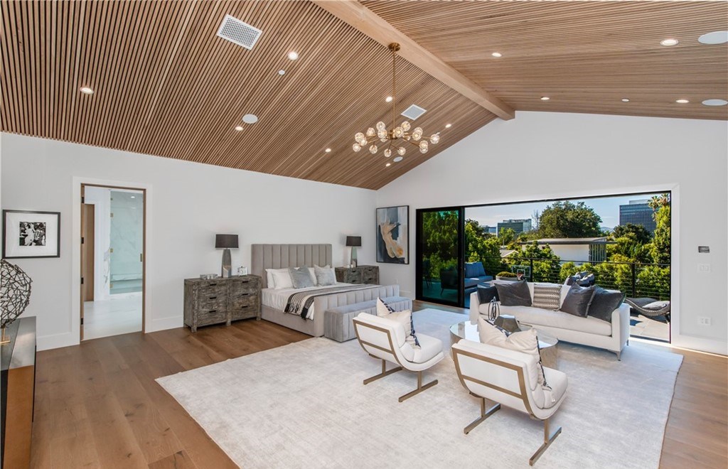 The Farmhouse in Encino, Exquisite new construction gated estate in the coveted enclave of Royal Oaks neighborhood with the sprawling grounds featuring a sparkling pool & spa, sports court, spacious elevated patio, grass area. This home located at 15825 Woodvale Rd, Encino, California