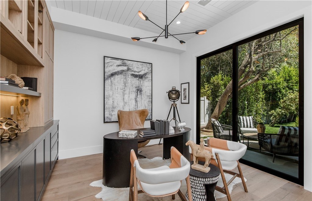 The Farmhouse in Encino, Exquisite new construction gated estate in the coveted enclave of Royal Oaks neighborhood with the sprawling grounds featuring a sparkling pool & spa, sports court, spacious elevated patio, grass area. This home located at 15825 Woodvale Rd, Encino, California