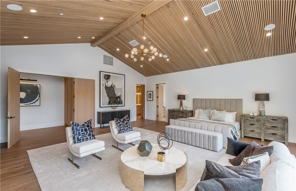 The Farmhouse in Encino, Exquisite new construction gated estate in the coveted enclave of Royal Oaks neighborhood with the sprawling grounds featuring a sparkling pool & spa, sports court, spacious elevated patio, grass area. This home located at 15825 Woodvale Rd, Encino, California