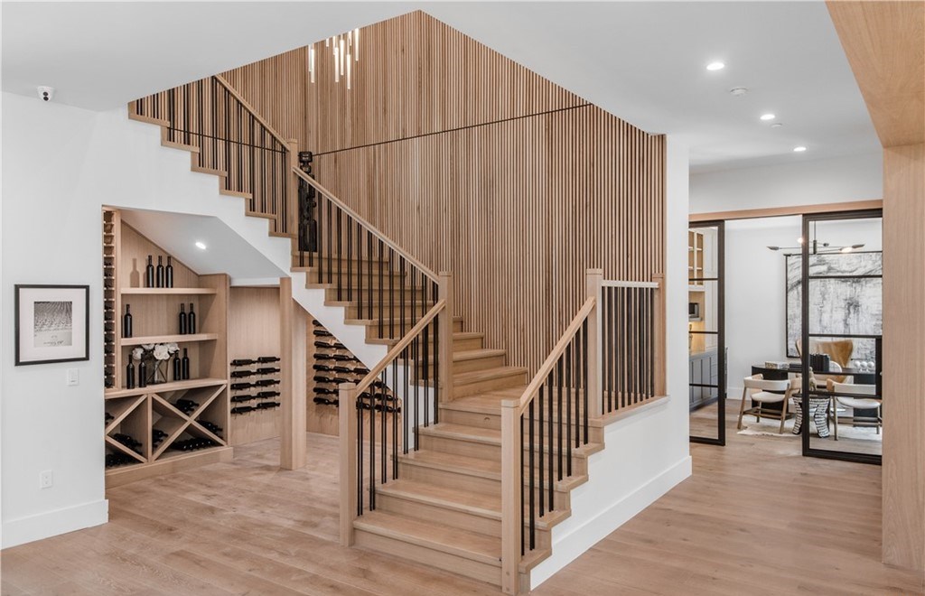 The Farmhouse in Encino, Exquisite new construction gated estate in the coveted enclave of Royal Oaks neighborhood with the sprawling grounds featuring a sparkling pool & spa, sports court, spacious elevated patio, grass area. This home located at 15825 Woodvale Rd, Encino, California