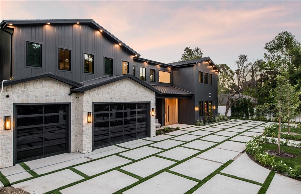 The Farmhouse in Encino, Exquisite new construction gated estate in the coveted enclave of Royal Oaks neighborhood with the sprawling grounds featuring a sparkling pool & spa, sports court, spacious elevated patio, grass area. This home located at 15825 Woodvale Rd, Encino, California