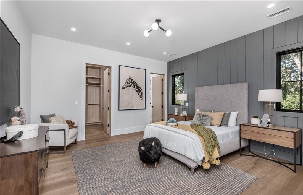 The Farmhouse in Encino, Exquisite new construction gated estate in the coveted enclave of Royal Oaks neighborhood with the sprawling grounds featuring a sparkling pool & spa, sports court, spacious elevated patio, grass area. This home located at 15825 Woodvale Rd, Encino, California