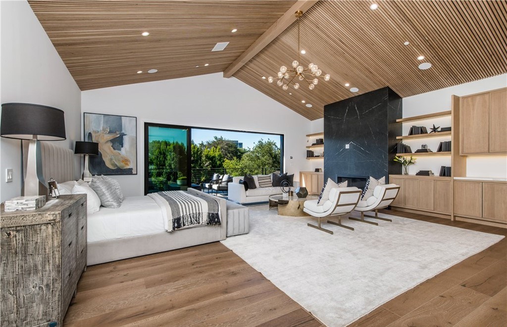 The Farmhouse in Encino, Exquisite new construction gated estate in the coveted enclave of Royal Oaks neighborhood with the sprawling grounds featuring a sparkling pool & spa, sports court, spacious elevated patio, grass area. This home located at 15825 Woodvale Rd, Encino, California