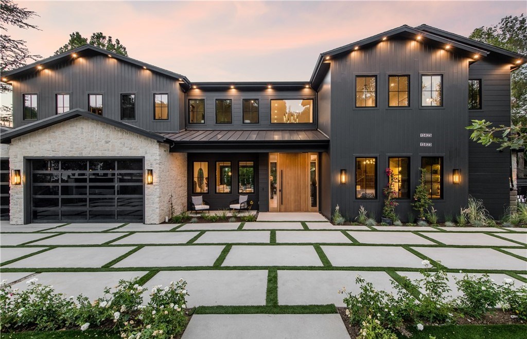 The Farmhouse in Encino, Exquisite new construction gated estate in the coveted enclave of Royal Oaks neighborhood with the sprawling grounds featuring a sparkling pool & spa, sports court, spacious elevated patio, grass area. This home located at 15825 Woodvale Rd, Encino, California