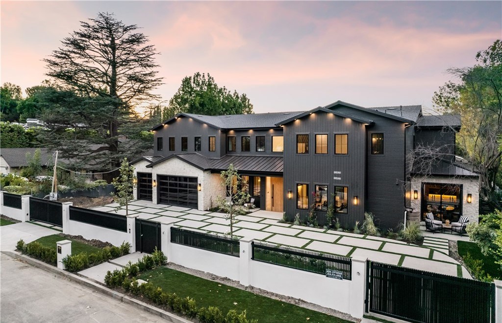 The Farmhouse in Encino, Exquisite new construction gated estate in the coveted enclave of Royal Oaks neighborhood with the sprawling grounds featuring a sparkling pool & spa, sports court, spacious elevated patio, grass area. This home located at 15825 Woodvale Rd, Encino, California