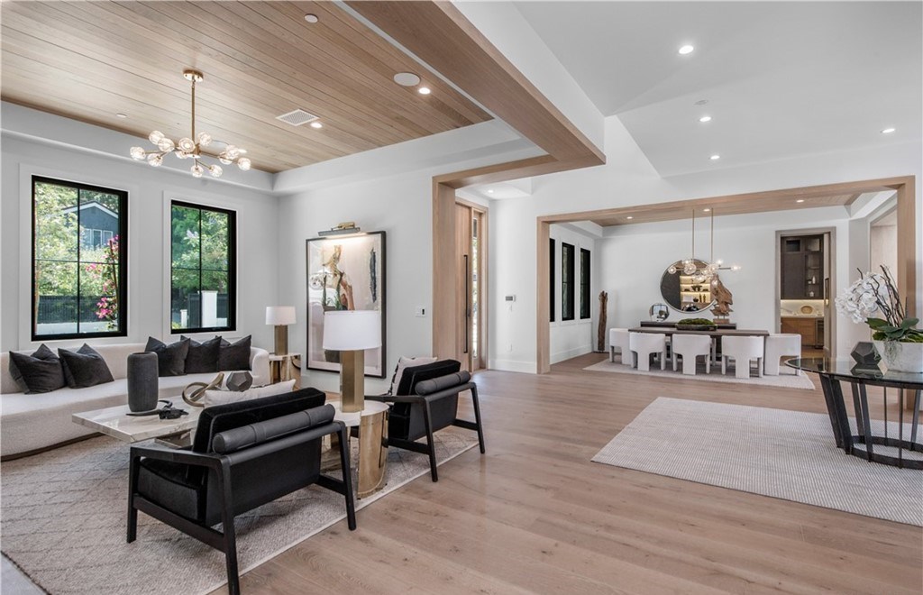 The Farmhouse in Encino, Exquisite new construction gated estate in the coveted enclave of Royal Oaks neighborhood with the sprawling grounds featuring a sparkling pool & spa, sports court, spacious elevated patio, grass area. This home located at 15825 Woodvale Rd, Encino, California
