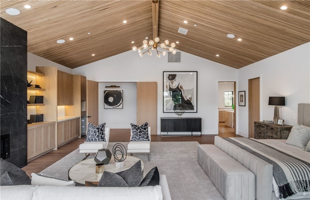The Farmhouse in Encino, Exquisite new construction gated estate in the coveted enclave of Royal Oaks neighborhood with the sprawling grounds featuring a sparkling pool & spa, sports court, spacious elevated patio, grass area. This home located at 15825 Woodvale Rd, Encino, California