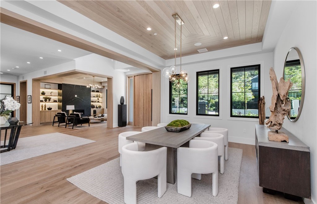 The Farmhouse in Encino, Exquisite new construction gated estate in the coveted enclave of Royal Oaks neighborhood with the sprawling grounds featuring a sparkling pool & spa, sports court, spacious elevated patio, grass area. This home located at 15825 Woodvale Rd, Encino, California