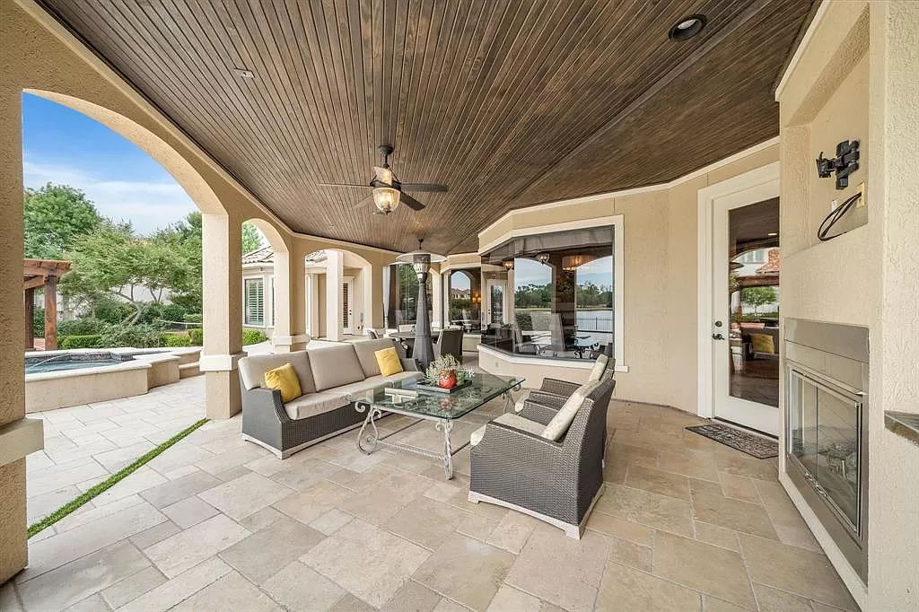 The Estate in Richmond, a private oasis nestled within The Retreat at Sovereign Shores offers resort style with a lavish swimming pool, tennis court, multiple outdoor patios is now available for sale. This home located at 12 Retreat Blvd, Richmond, Texas 