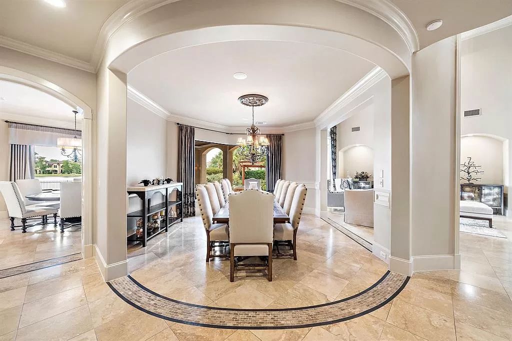 The Estate in Richmond, a private oasis nestled within The Retreat at Sovereign Shores offers resort style with a lavish swimming pool, tennis court, multiple outdoor patios is now available for sale. This home located at 12 Retreat Blvd, Richmond, Texas 