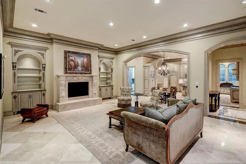 The Masterpiece in Houston, a memorial estate showcases cohesive French design elements blending rustic textures and bold materials. This home located at 705 Kuhlman Rd, Houston, Texas.