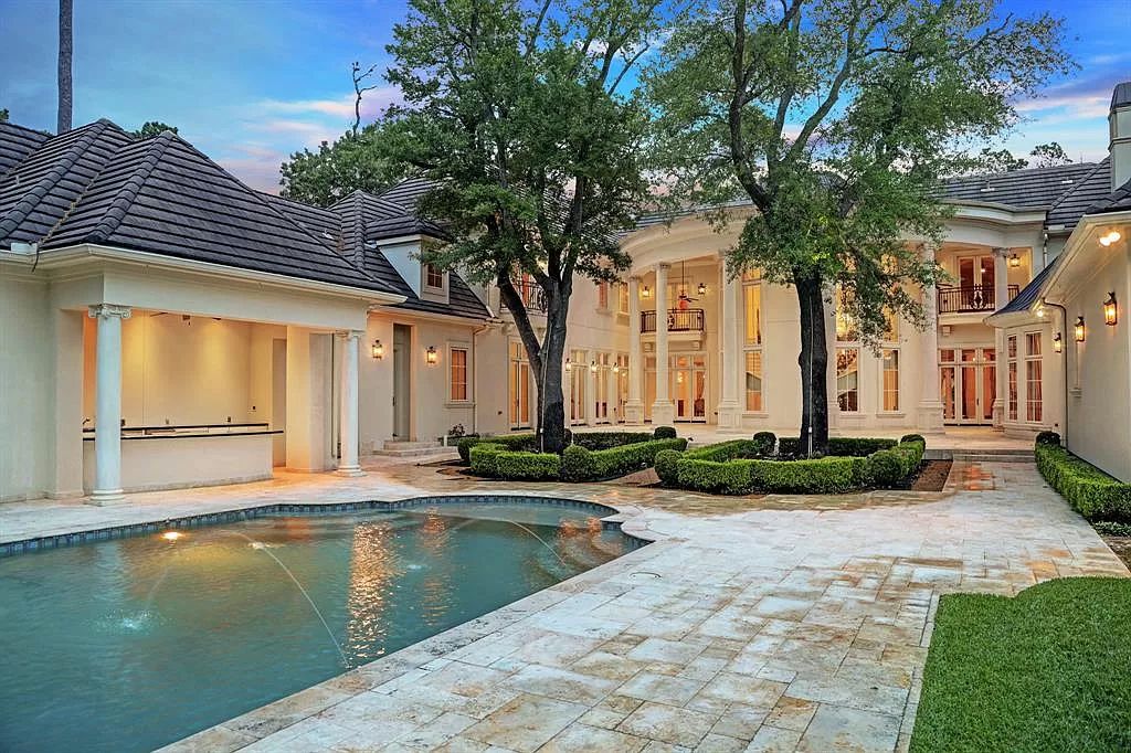 The Masterpiece in Houston, a memorial estate showcases cohesive French design elements blending rustic textures and bold materials. This home located at 705 Kuhlman Rd, Houston, Texas.