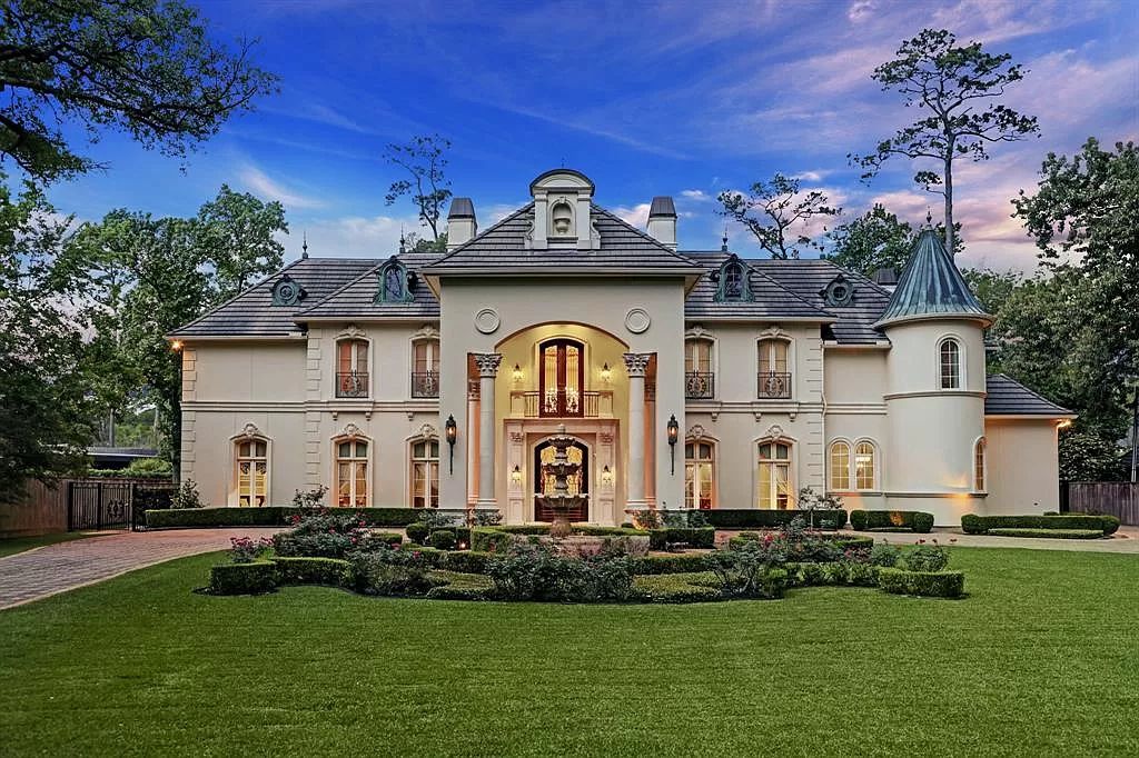 The Masterpiece in Houston, a memorial estate showcases cohesive French design elements blending rustic textures and bold materials. This home located at 705 Kuhlman Rd, Houston, Texas.
