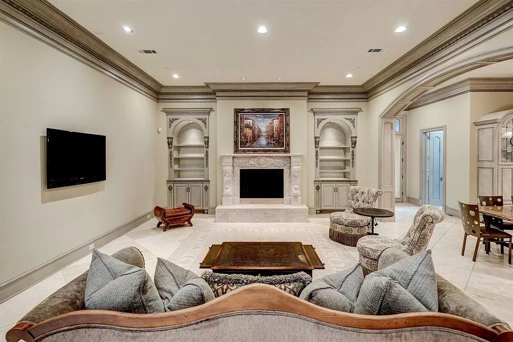 The Masterpiece in Houston, a memorial estate showcases cohesive French design elements blending rustic textures and bold materials. This home located at 705 Kuhlman Rd, Houston, Texas.