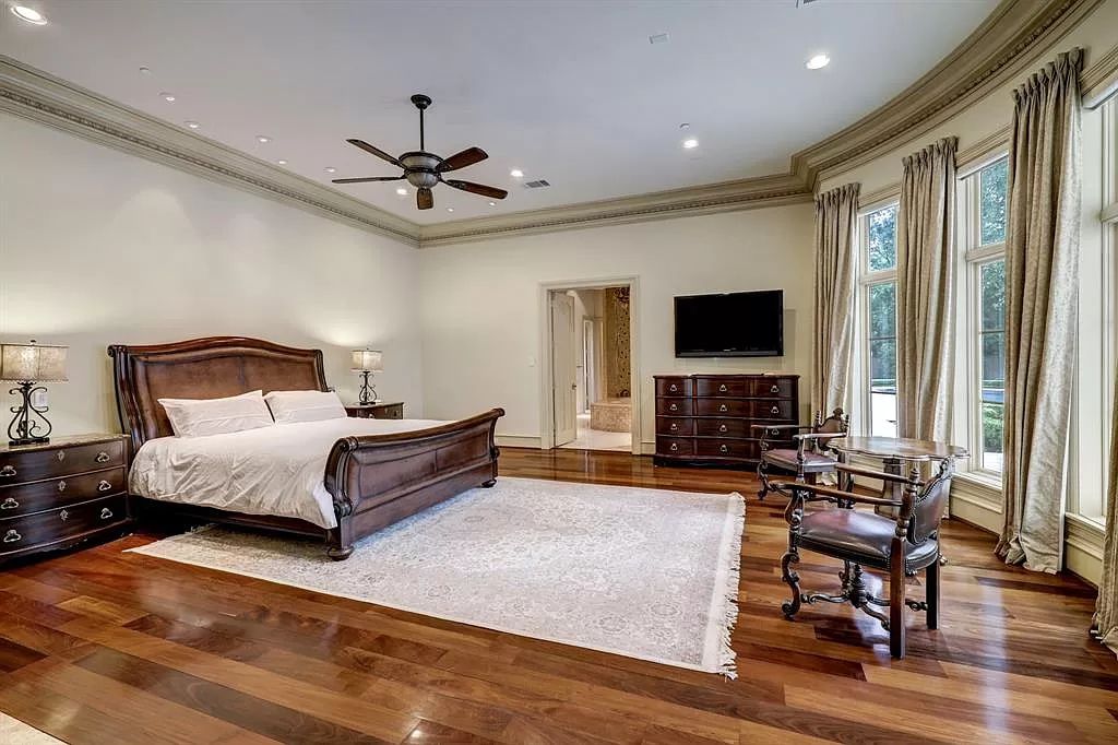 The Masterpiece in Houston, a memorial estate showcases cohesive French design elements blending rustic textures and bold materials. This home located at 705 Kuhlman Rd, Houston, Texas.