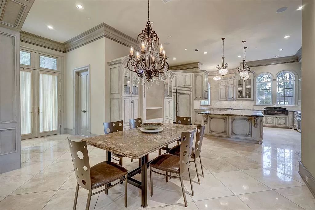 The Masterpiece in Houston, a memorial estate showcases cohesive French design elements blending rustic textures and bold materials. This home located at 705 Kuhlman Rd, Houston, Texas.