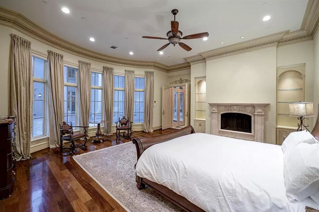 The Masterpiece in Houston, a memorial estate showcases cohesive French design elements blending rustic textures and bold materials. This home located at 705 Kuhlman Rd, Houston, Texas.