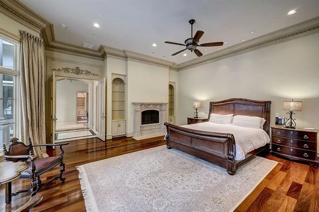 The Masterpiece in Houston, a memorial estate showcases cohesive French design elements blending rustic textures and bold materials. This home located at 705 Kuhlman Rd, Houston, Texas.