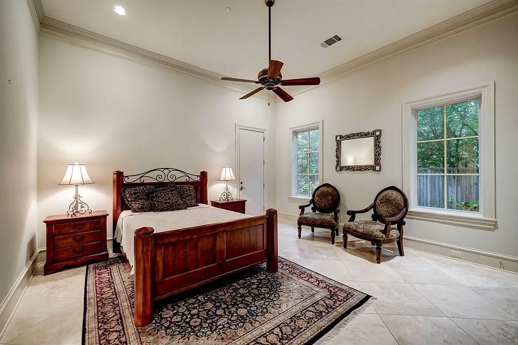 The Masterpiece in Houston, a memorial estate showcases cohesive French design elements blending rustic textures and bold materials. This home located at 705 Kuhlman Rd, Houston, Texas.