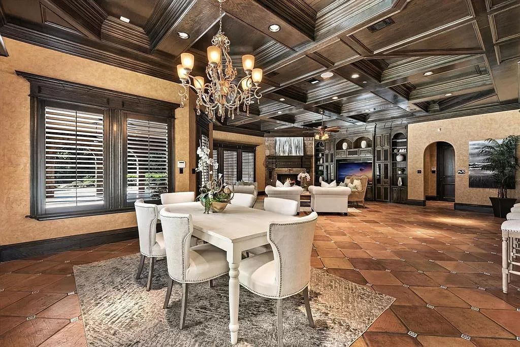 The Estate in Southlake, a castle-like residence blends old world appeal with a modern layout featuring breathtaking ceiling treatments and hand-carved moldings is now available for sale. This home located at 3716 N White Chapel Blvd, Southlake, Texas