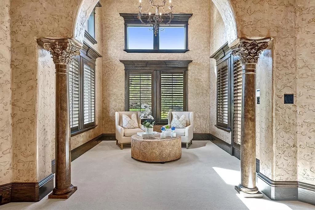 The Estate in Southlake, a castle-like residence blends old world appeal with a modern layout featuring breathtaking ceiling treatments and hand-carved moldings is now available for sale. This home located at 3716 N White Chapel Blvd, Southlake, Texas