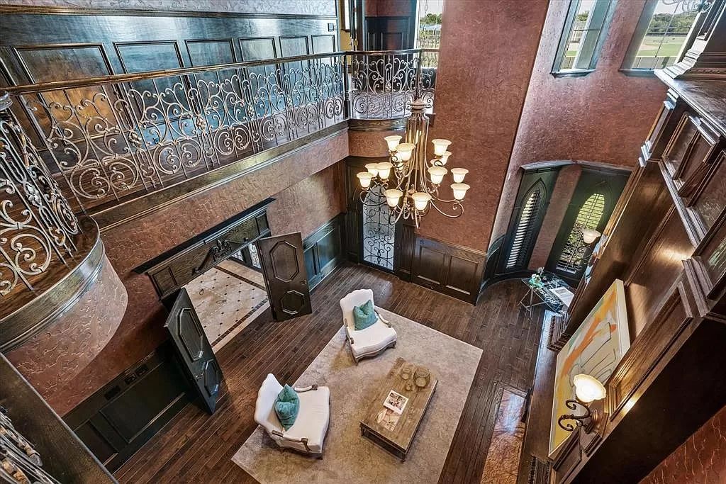 The Estate in Southlake, a castle-like residence blends old world appeal with a modern layout featuring breathtaking ceiling treatments and hand-carved moldings is now available for sale. This home located at 3716 N White Chapel Blvd, Southlake, Texas
