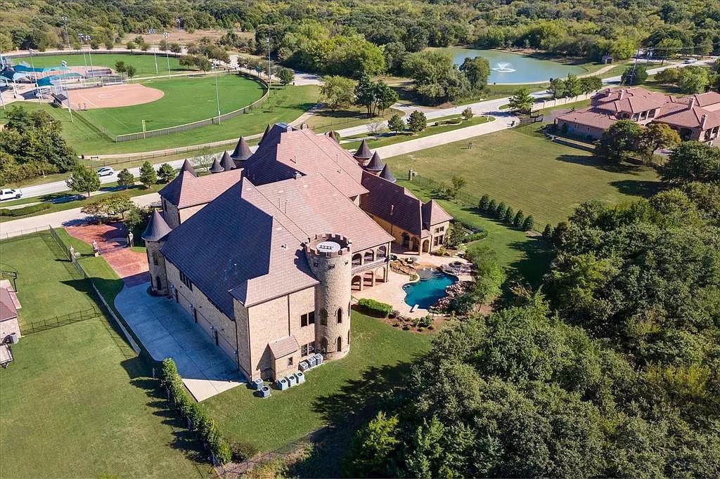The Estate in Southlake, a castle-like residence blends old world appeal with a modern layout featuring breathtaking ceiling treatments and hand-carved moldings is now available for sale. This home located at 3716 N White Chapel Blvd, Southlake, Texas