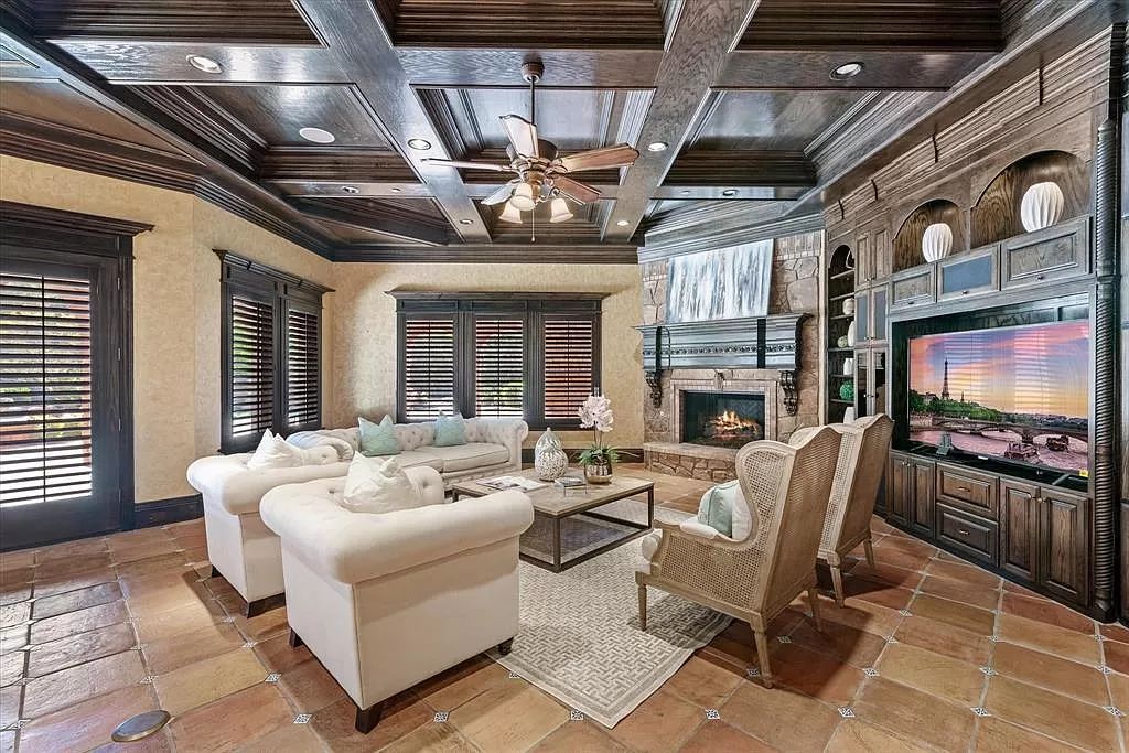 The Estate in Southlake, a castle-like residence blends old world appeal with a modern layout featuring breathtaking ceiling treatments and hand-carved moldings is now available for sale. This home located at 3716 N White Chapel Blvd, Southlake, Texas