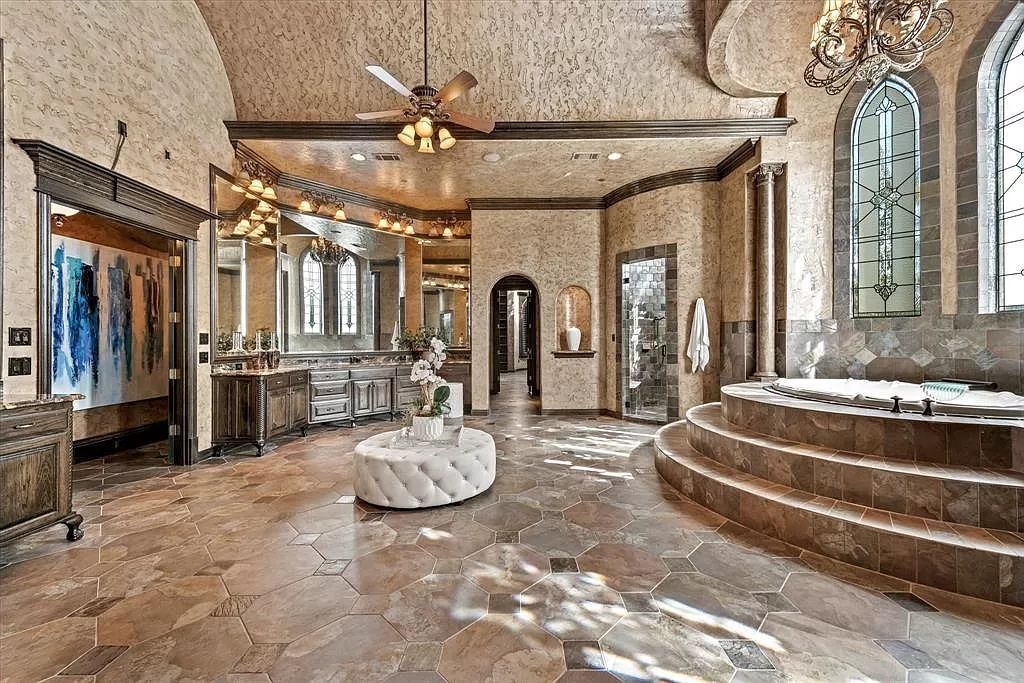 The Estate in Southlake, a castle-like residence blends old world appeal with a modern layout featuring breathtaking ceiling treatments and hand-carved moldings is now available for sale. This home located at 3716 N White Chapel Blvd, Southlake, Texas