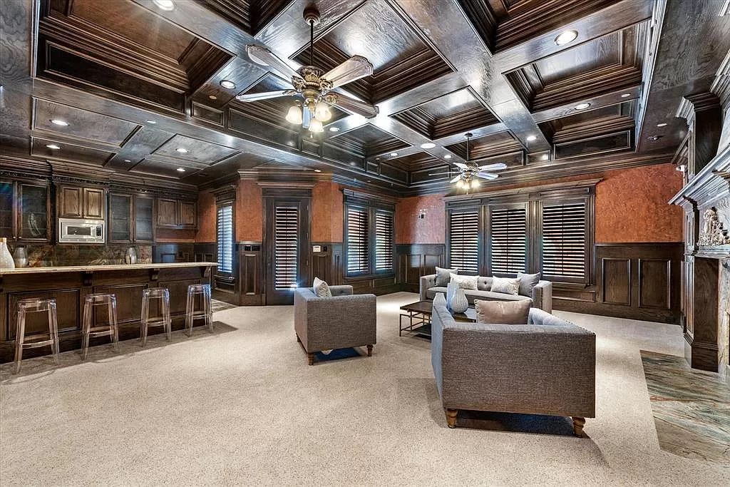 The Estate in Southlake, a castle-like residence blends old world appeal with a modern layout featuring breathtaking ceiling treatments and hand-carved moldings is now available for sale. This home located at 3716 N White Chapel Blvd, Southlake, Texas