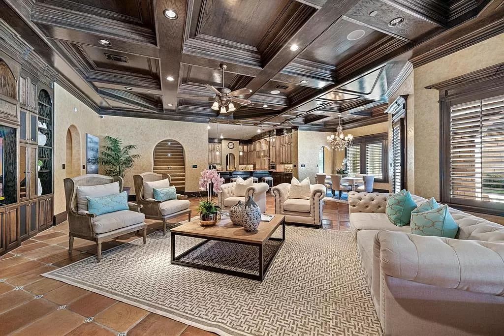The Estate in Southlake, a castle-like residence blends old world appeal with a modern layout featuring breathtaking ceiling treatments and hand-carved moldings is now available for sale. This home located at 3716 N White Chapel Blvd, Southlake, Texas