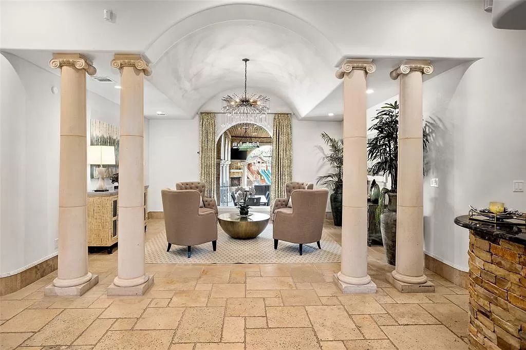 The Estate in Fort Worth, a beautiful home has an extraordinary outdoor entertainment with heated pool and waterslide on approximately 1.3 meticulously landscaped acres is now available for sale. This home located at 9517 Bella Terra Dr, Fort Worth, Texas