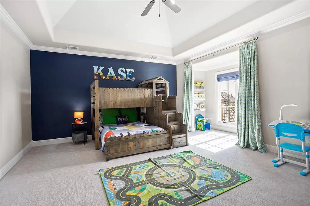 The Estate in Fort Worth, a beautiful home has an extraordinary outdoor entertainment with heated pool and waterslide on approximately 1.3 meticulously landscaped acres is now available for sale. This home located at 9517 Bella Terra Dr, Fort Worth, Texas