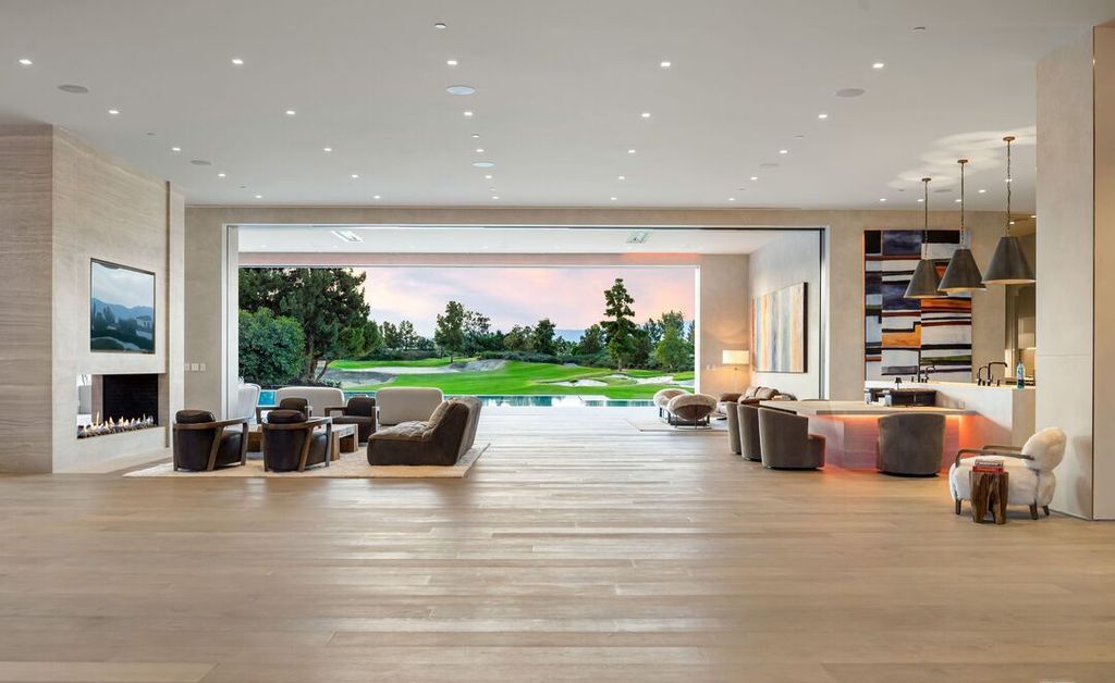 The Madison Club Mansion in La Quinta is an exquisite warm contemporary home with massive gates and mature and magnificent landscape on all sides create unique atmospheric privacy now available for sale. This home located at 81560 Baffin Ave, La Quinta, California