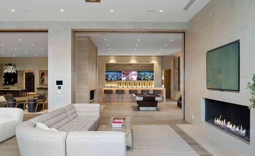 The Madison Club Mansion in La Quinta is an exquisite warm contemporary home with massive gates and mature and magnificent landscape on all sides create unique atmospheric privacy now available for sale. This home located at 81560 Baffin Ave, La Quinta, California