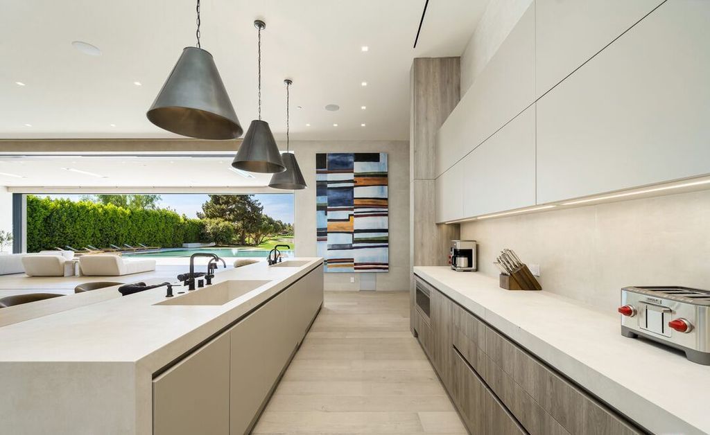 The Madison Club Mansion in La Quinta is an exquisite warm contemporary home with massive gates and mature and magnificent landscape on all sides create unique atmospheric privacy now available for sale. This home located at 81560 Baffin Ave, La Quinta, California
