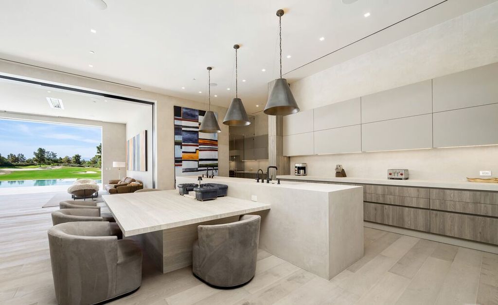The Madison Club Mansion in La Quinta is an exquisite warm contemporary home with massive gates and mature and magnificent landscape on all sides create unique atmospheric privacy now available for sale. This home located at 81560 Baffin Ave, La Quinta, California