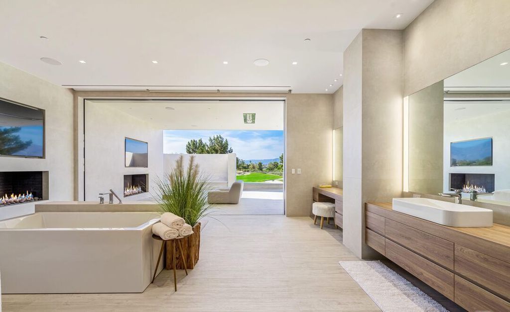 The Madison Club Mansion in La Quinta is an exquisite warm contemporary home with massive gates and mature and magnificent landscape on all sides create unique atmospheric privacy now available for sale. This home located at 81560 Baffin Ave, La Quinta, California