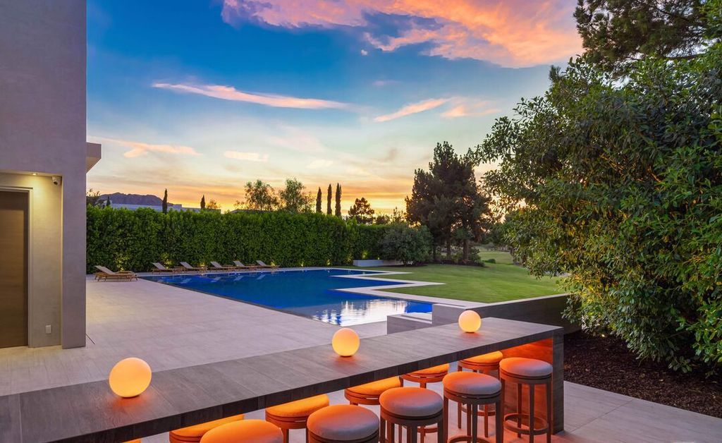 The Madison Club Mansion in La Quinta is an exquisite warm contemporary home with massive gates and mature and magnificent landscape on all sides create unique atmospheric privacy now available for sale. This home located at 81560 Baffin Ave, La Quinta, California