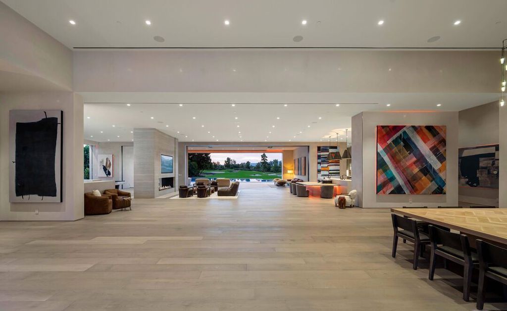 The Madison Club Mansion in La Quinta is an exquisite warm contemporary home with massive gates and mature and magnificent landscape on all sides create unique atmospheric privacy now available for sale. This home located at 81560 Baffin Ave, La Quinta, California