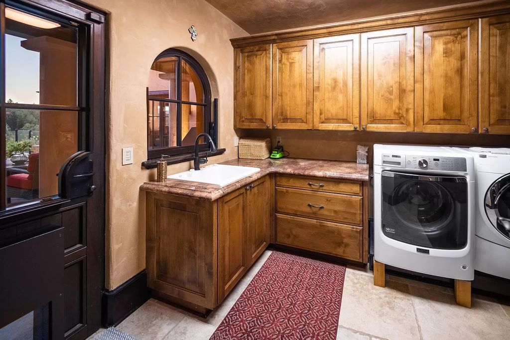 The Estate in Bend offers gourmet kitchen, primary wing, home gym and an expansive outdoor space, now available for sale. This home located at 1746 Wild Rye Cir, Bend, Oregon