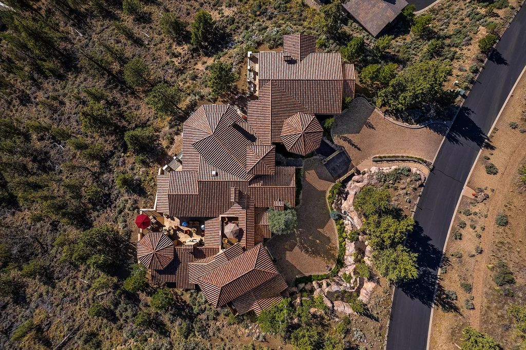 The Estate in Bend offers gourmet kitchen, primary wing, home gym and an expansive outdoor space, now available for sale. This home located at 1746 Wild Rye Cir, Bend, Oregon