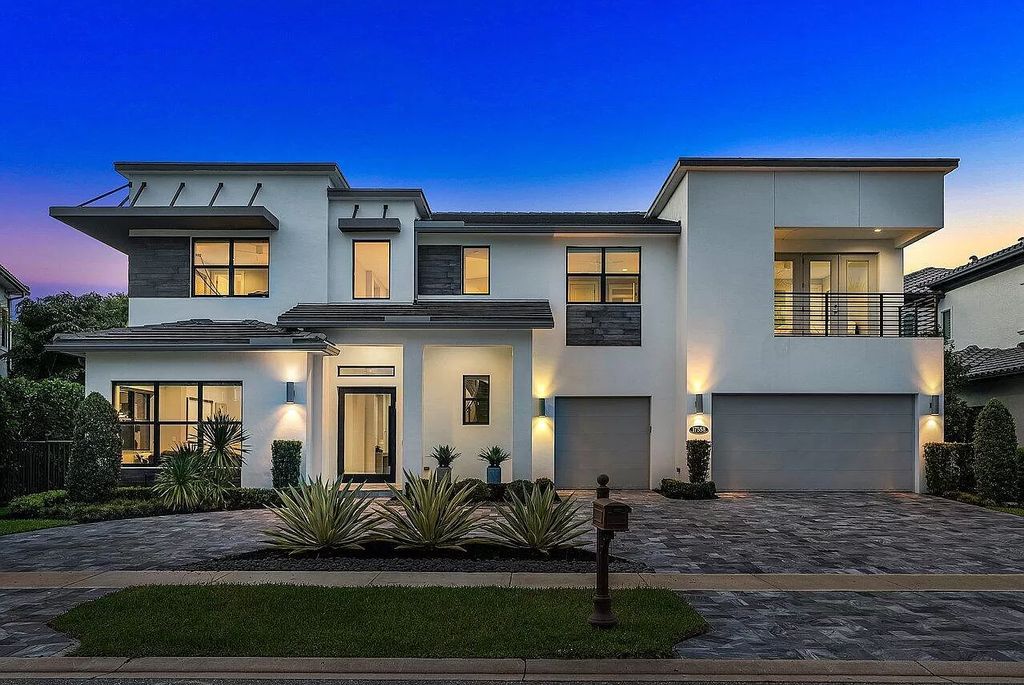 The Home in Boca Raton, a contemporary estate offers notable features include concrete construction, impact glass, custom entry ''pivot'' door, wine storage, theater room  is now available for sale. This home located at 17558 Cadena Dr, Boca Raton, Florida